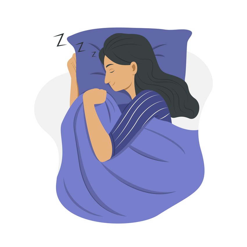A woman is sleeping in bed with a blue blanket while preparing for the MCCQE Part 1 exam using Ace QBank for her MCCQE1 exam preparation.