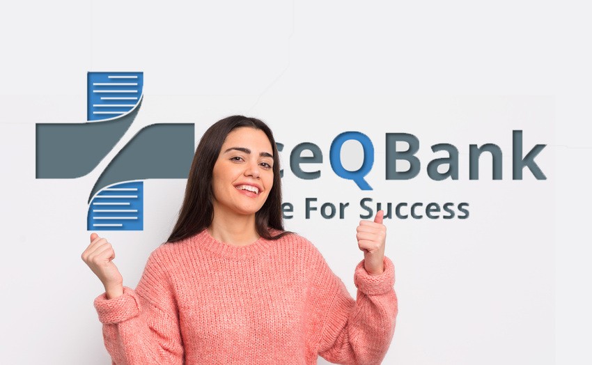 A woman in a pink sweater smiles and gives two thumbs up in front of a wall featuring the " Ace QBank" logo and the tagline "Care For Success," highlighting her confidence in MCCQE1 exam preparation with Ace QBank.