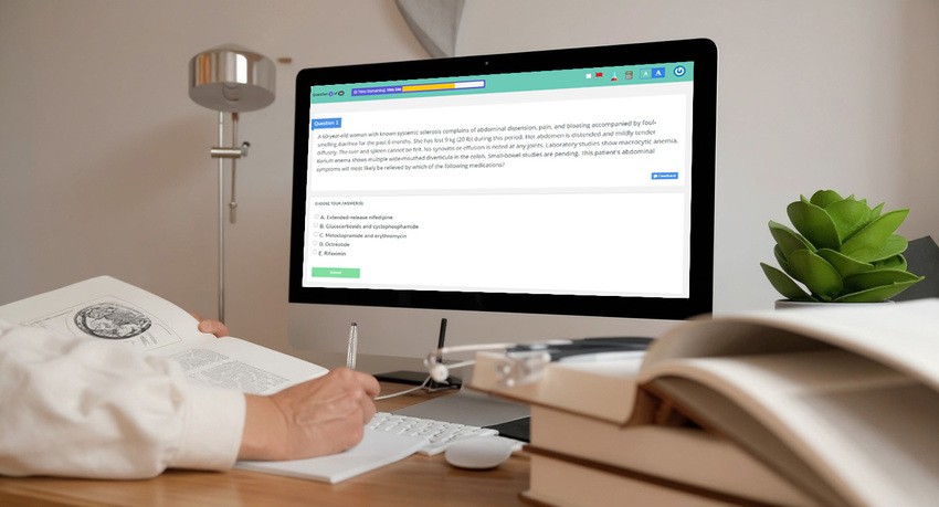 Person taking notes from an open book while viewing an Ace QBank online medical exam question about Why Do Most MCCQE1 Study Plans Fail on a large monitor, surrounded by stacked books and a potted plant.
