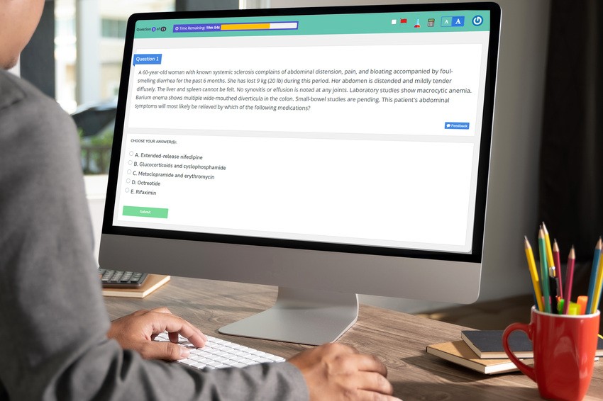Person using a desktop computer to answer a multiple-choice medical question on Ace QBank. A leading MCCQE learning platform. with answer options displayed on the screen, highlighting why take notes during MCCQE question practice can enhance understanding and retention.
